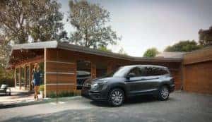 Honda Pilot waiting outside the house 