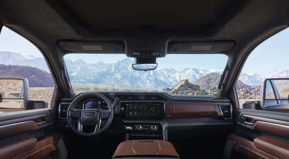 The leather interior of the Denali trim of a GMC Sierra for sale near Elgin.