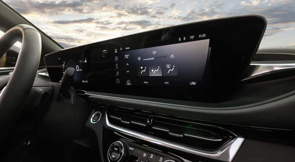 The infotainment screen and dashboard in a 2024 Buick Envista ST at a Buick dealer near Bloomingdale.