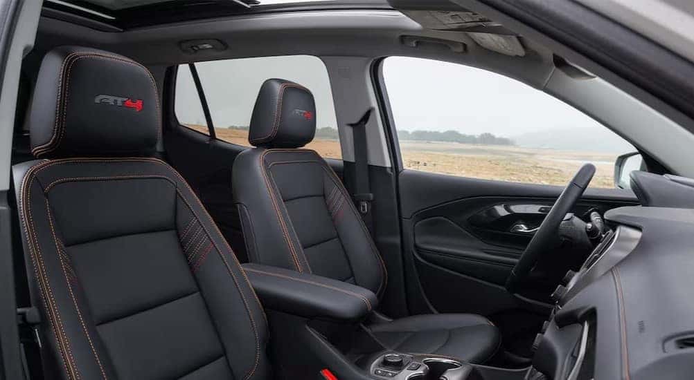 The black interior in a 2024 GMC Terrain AT4 is shown.