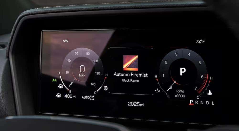 A close-up of the digital dash is shown in a 2025 GMC Terrain.
