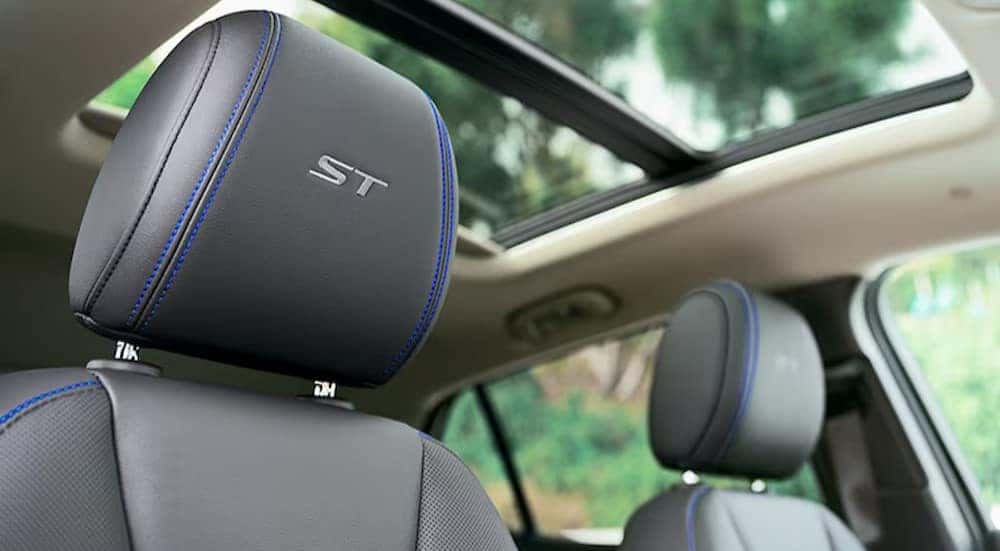 A close-up of a gray seat is shown in a 2025 Buick Encore ST.