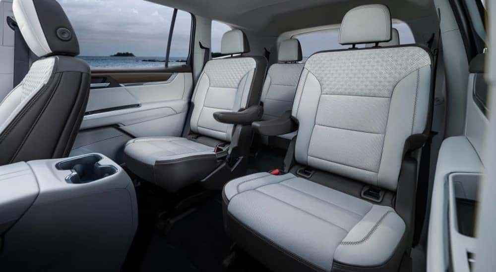 The white interior seating of a 2025 GMC Acadia for sale near Aurora.