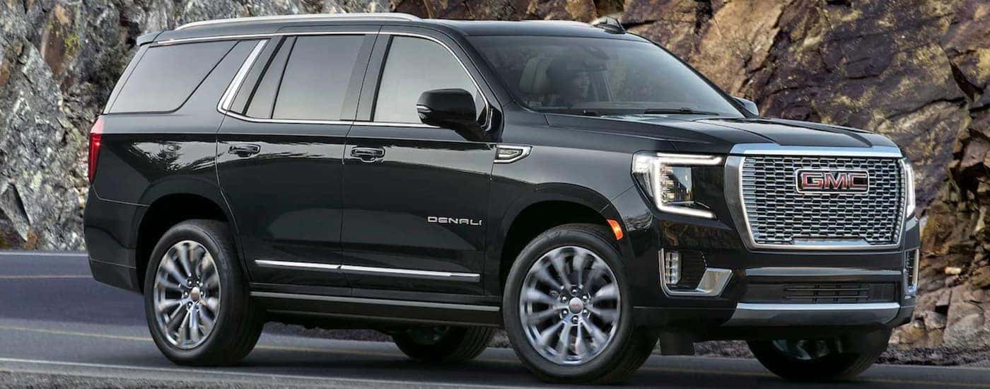 Black 2023 GMC Yukon for sale on a test drive