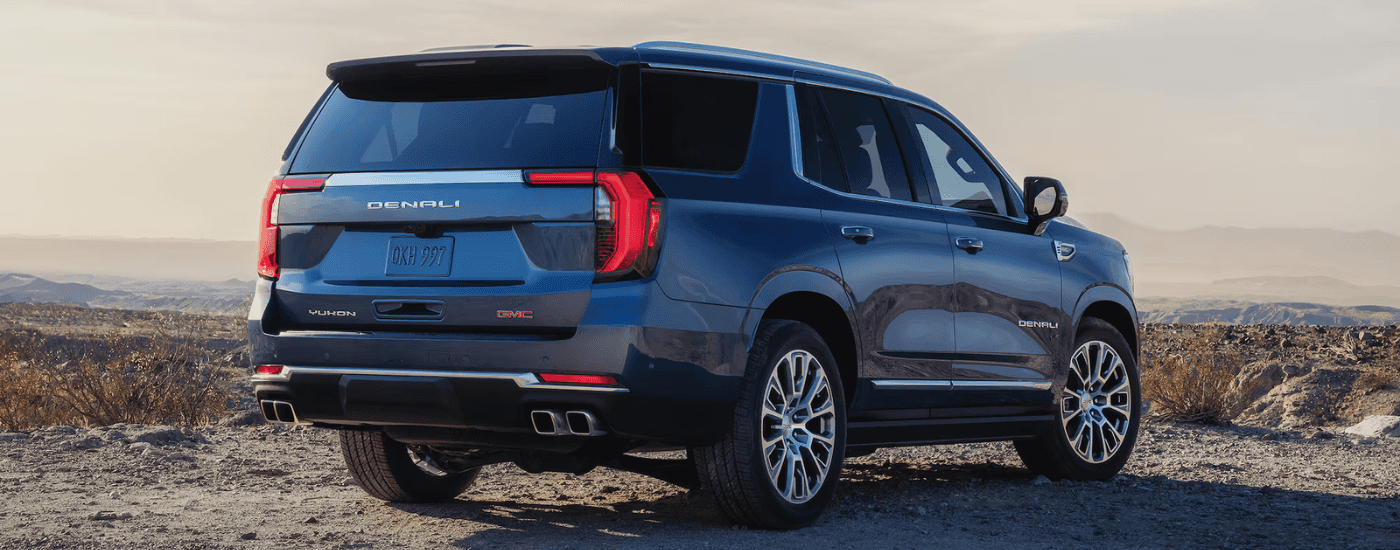 Rear look at a grey 2026 GMC Yukon