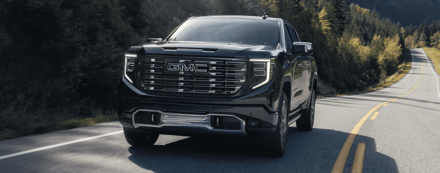 Black 2026 GMC Sierra 1500 Denali for sale near Geneva on a test drive