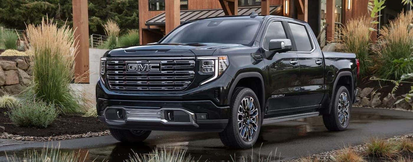 A gray 2026 GMC Sierra 1500 parked on a driveway.