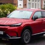 Red Honda SUV Parked on Suburban Street