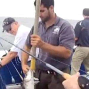 veterans fishing off a boat
