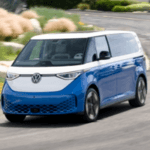 Blue Volkswagen ID. Buzz Driving Down Street