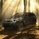 New 2026 Jeep Cherokee parked in woods