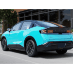 2026 Nissan LEAF driving down highway