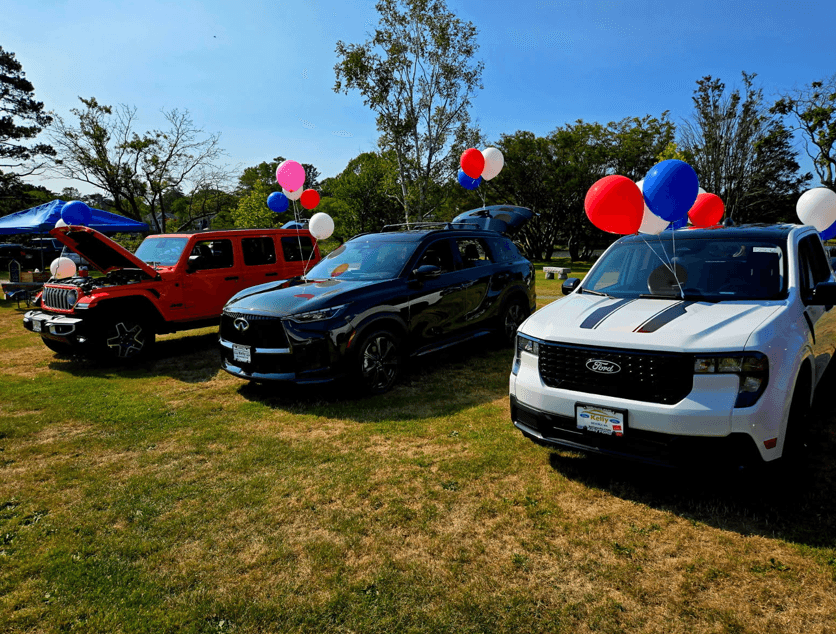 Variety of new vehicles on display Jeep Wrangler, INFINITI QX60, and Ford Maverick lined up