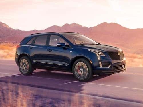 2024 Cadillac XT5 driving on a road