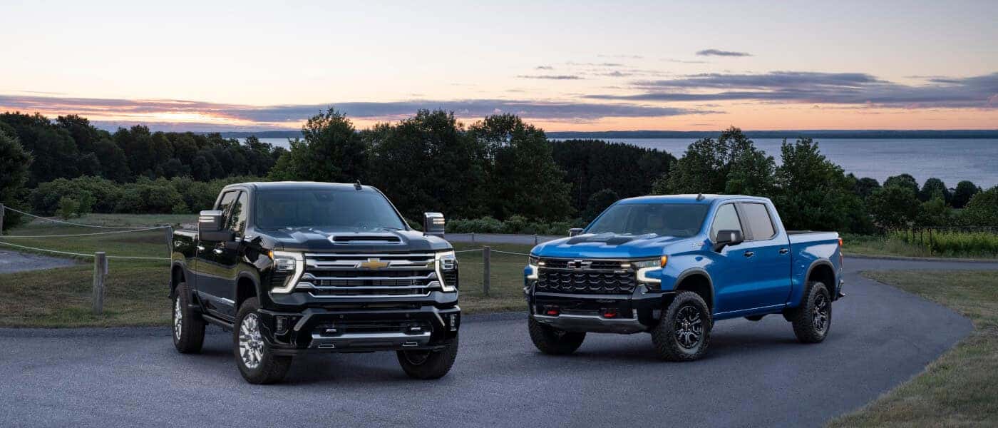 2026 Chevy Silverado 2500 HD Exterior Two Parked By Lake