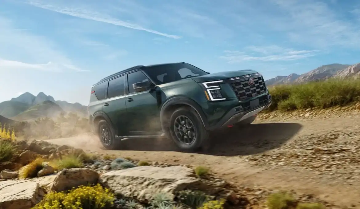 2026 Nissan Armada PRO-4X in Forest Green, off-road front view