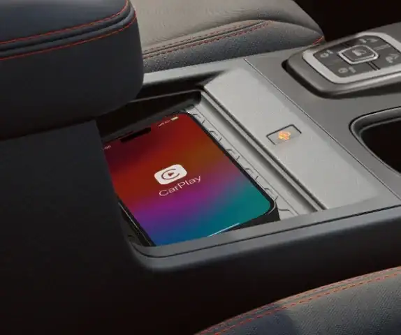 2026 Nissan Frontier interior wireless charging and Apple CarPlay