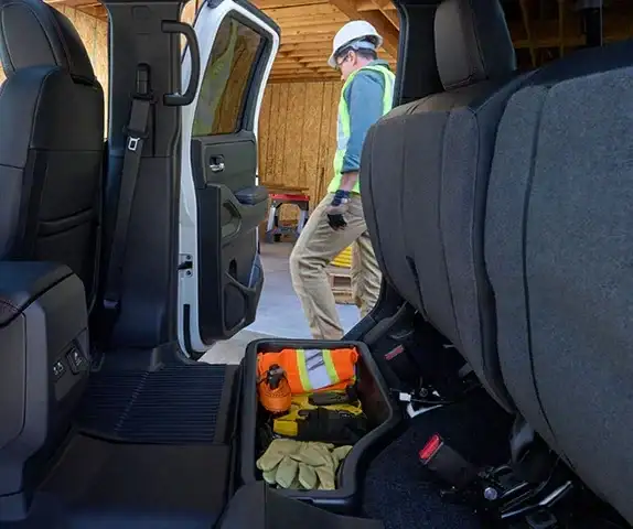 2026 Nissan Frontier rear under-seat storage interior