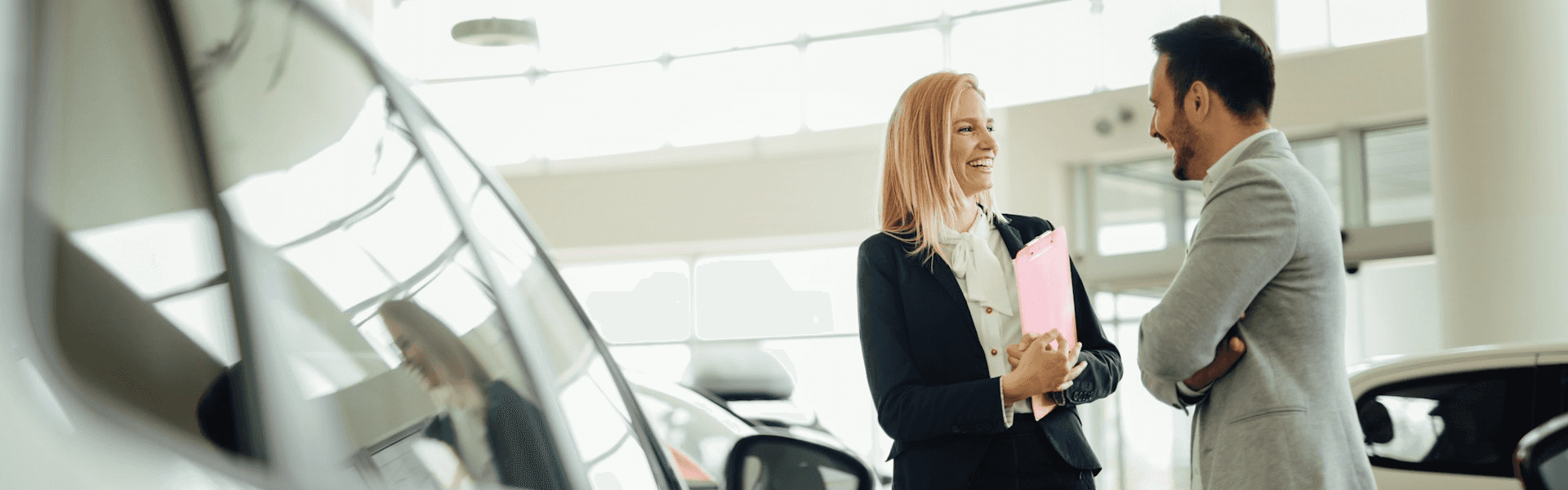 saleswoman greetings customer