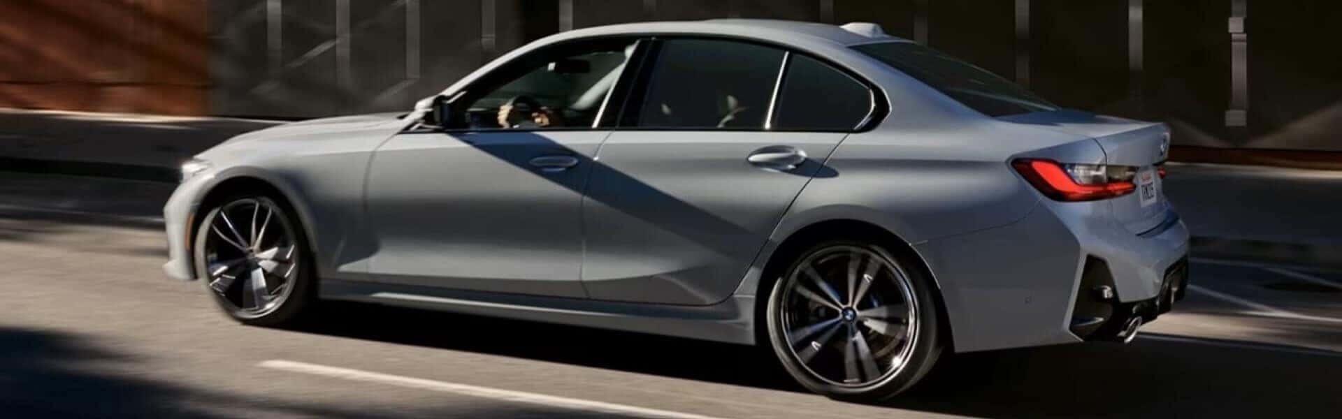 Quality Pre-Owned 2025 BMW 3 Series Driving On A Street