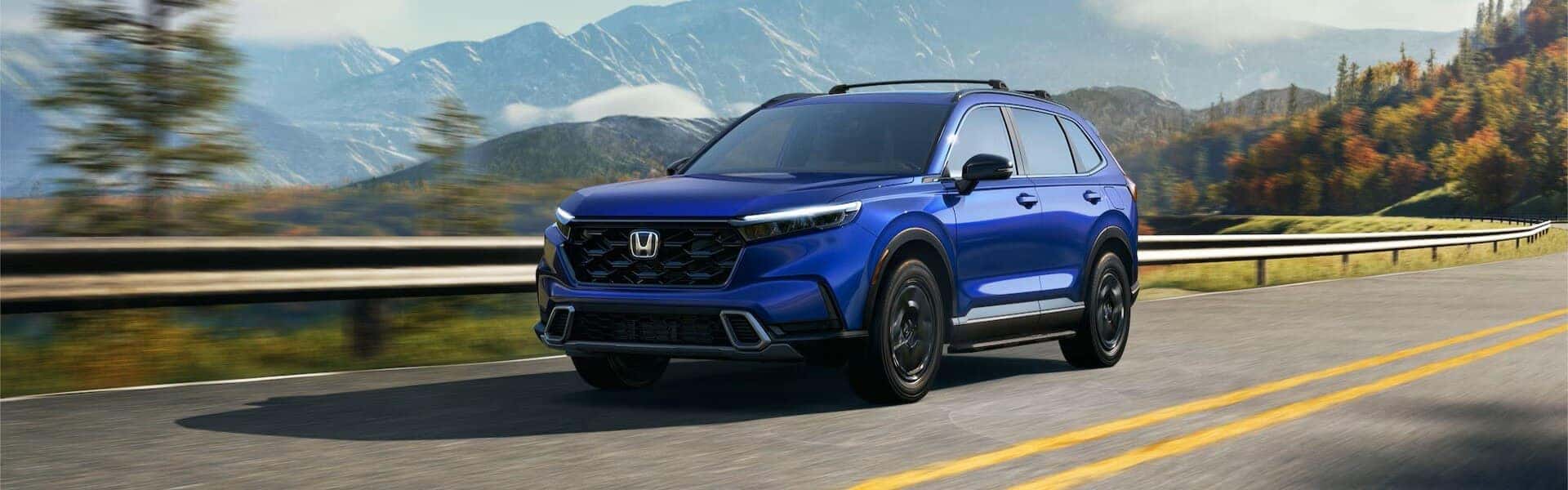 2025 Honda CR-V Sport Touring Hybrid In Still Night Pearl Banner