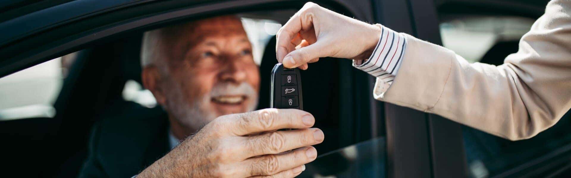 Old Man Getting Key For Car