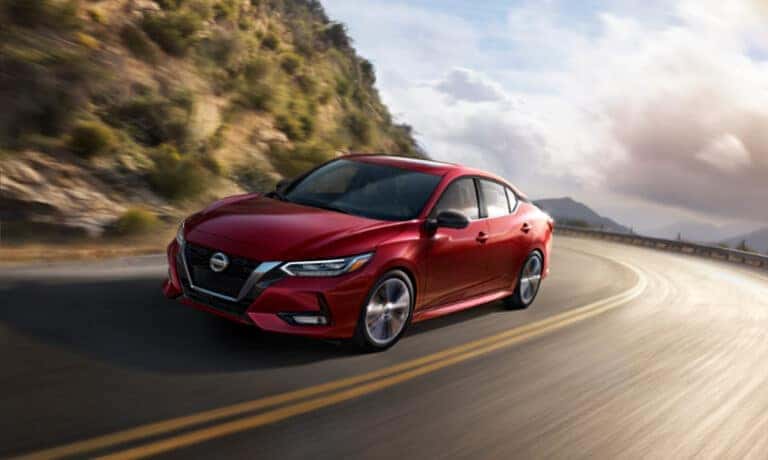 2022 Nissan Sentra driving fast on a curved road