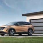 nissan ariya outside a home