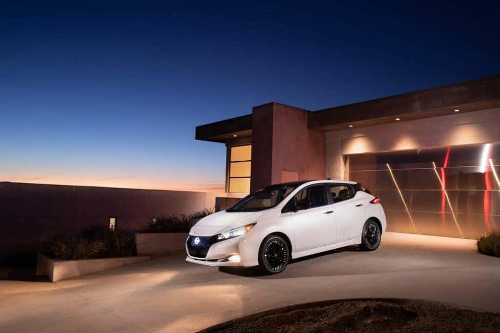 Nissan LEAF Parked Front 3/4 View in Front of a Mansion