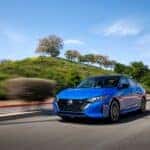 2025 Nissan Sentra Electric Blue Metallic driving