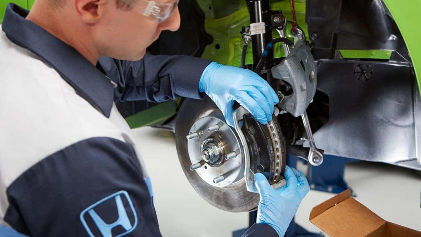 Honda service tech changing brakes