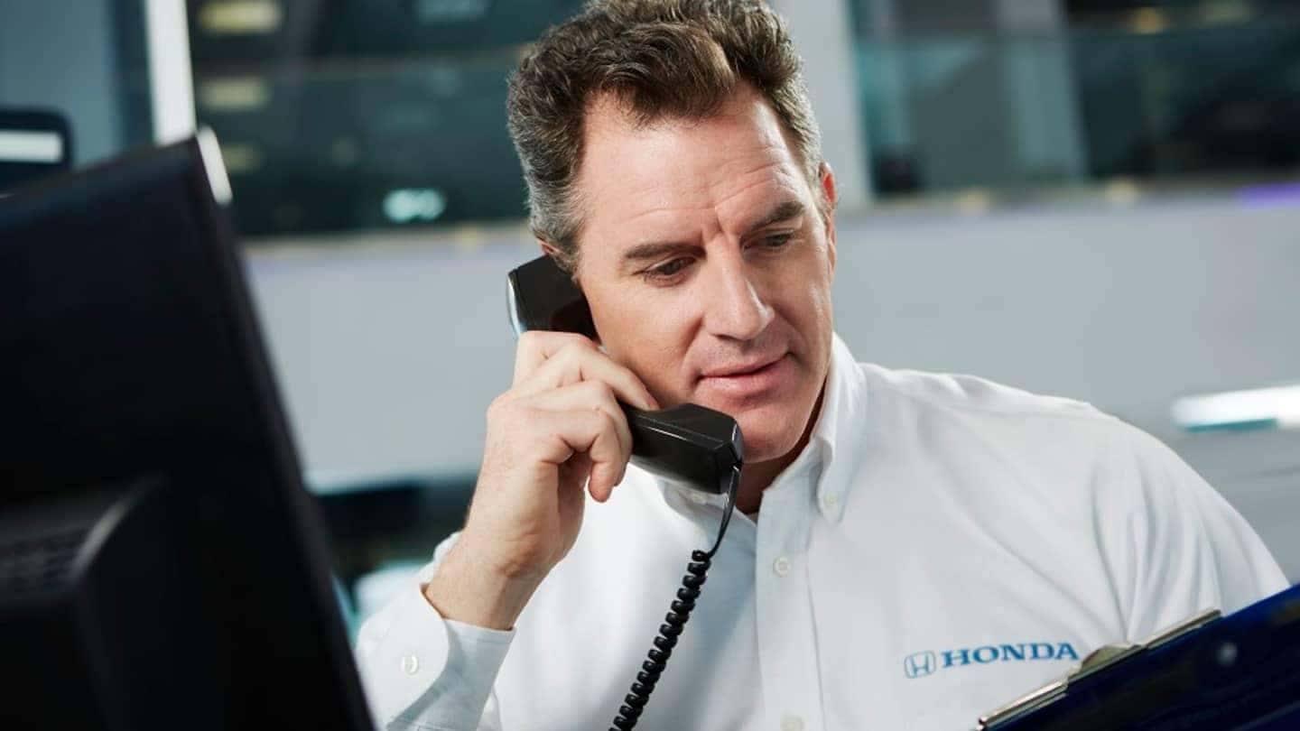 Honda employee on phone