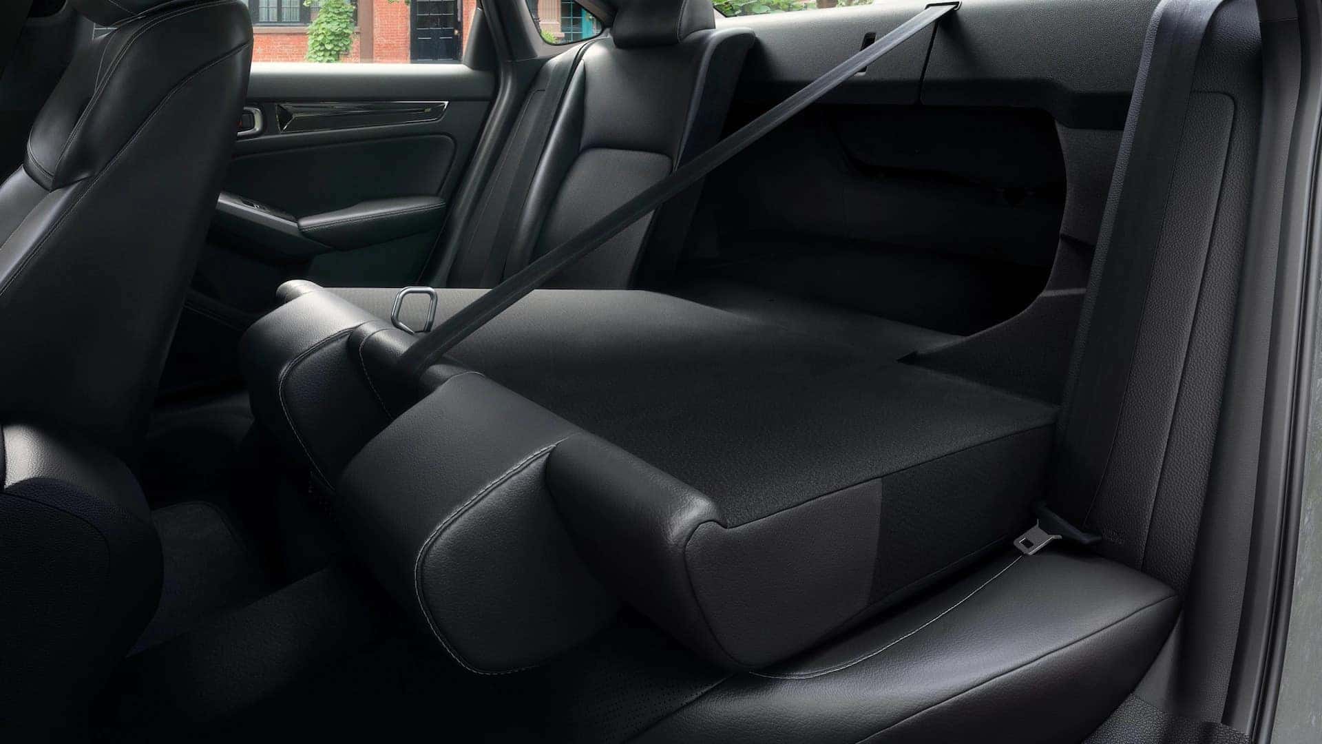 folded backseat showing the cargo space of a honda civic sedan