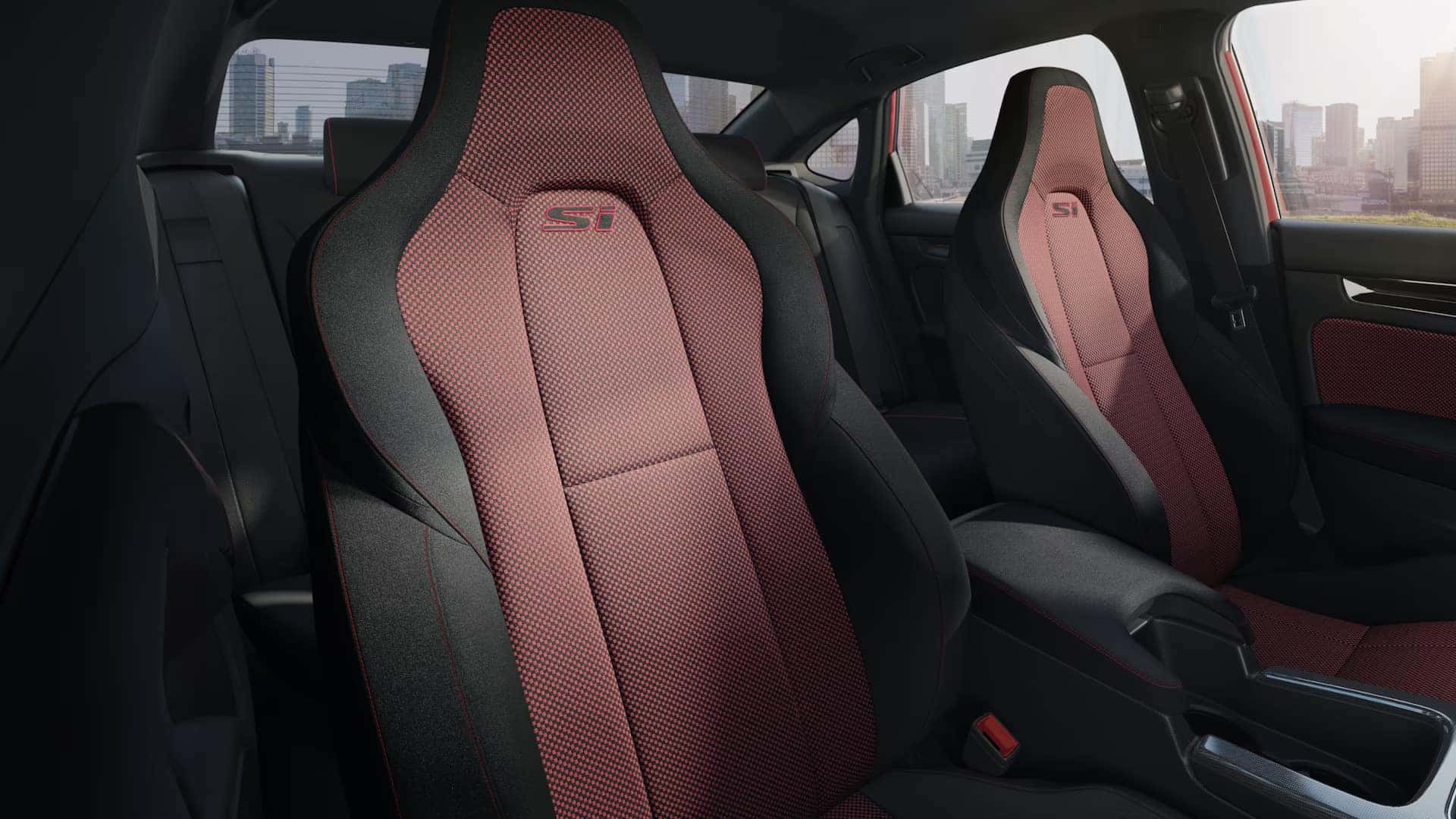 the interior seats of a honda civic si