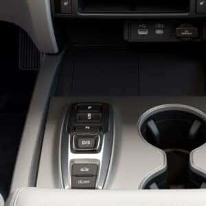 the center console area showcasing cupholders