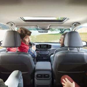 a group of men in the honda ridgeline