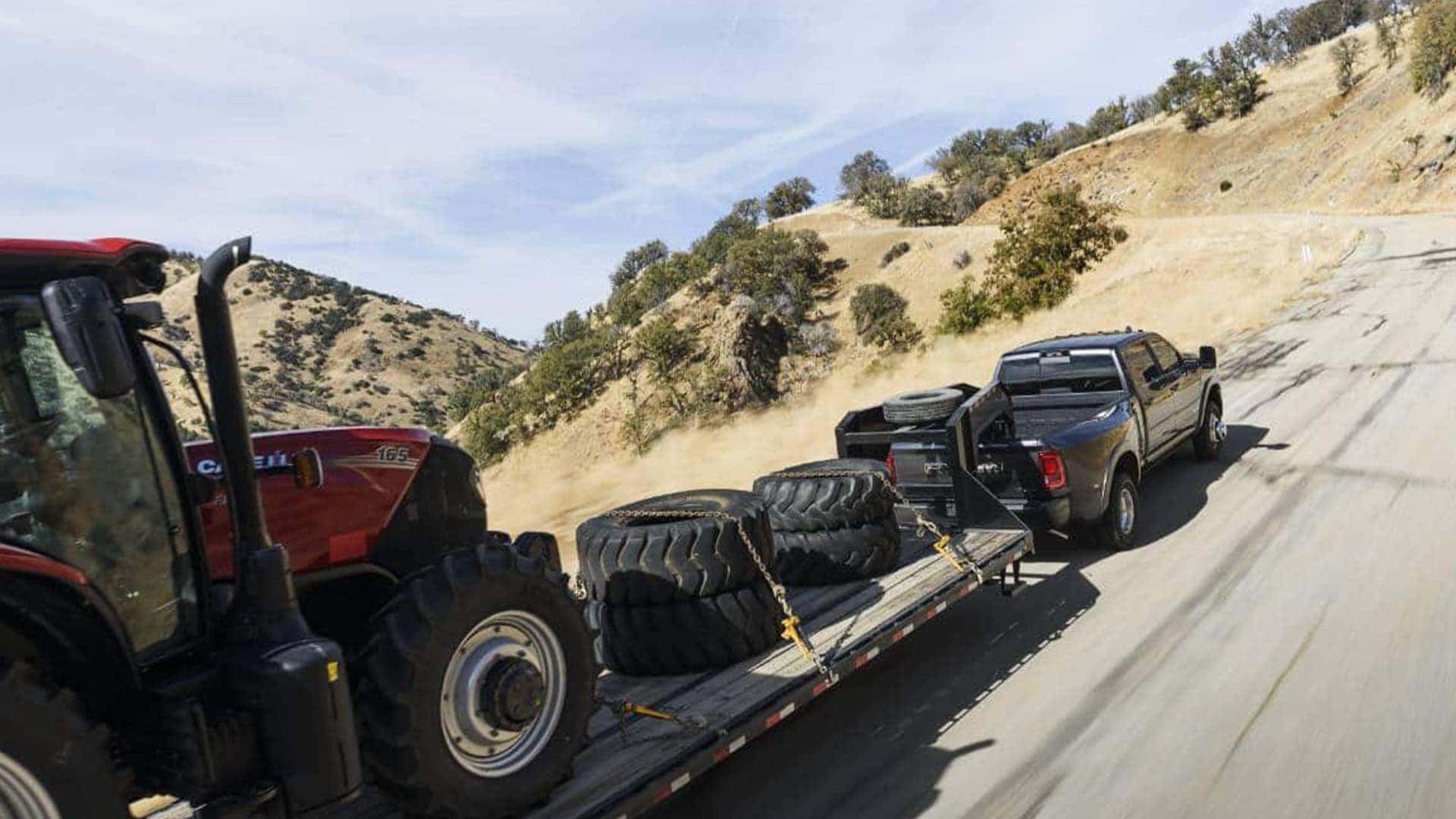 2025 Ram 3500 Hauling Trailer with a Tractor