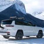 white-jeep-in-the-mountains