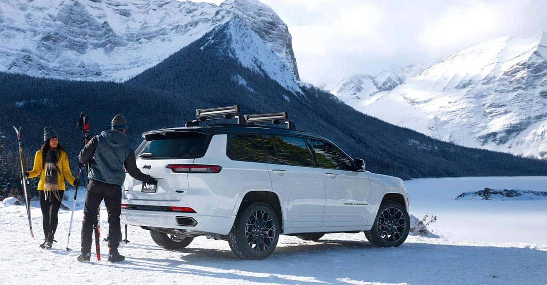 white-jeep-in-the-mountains