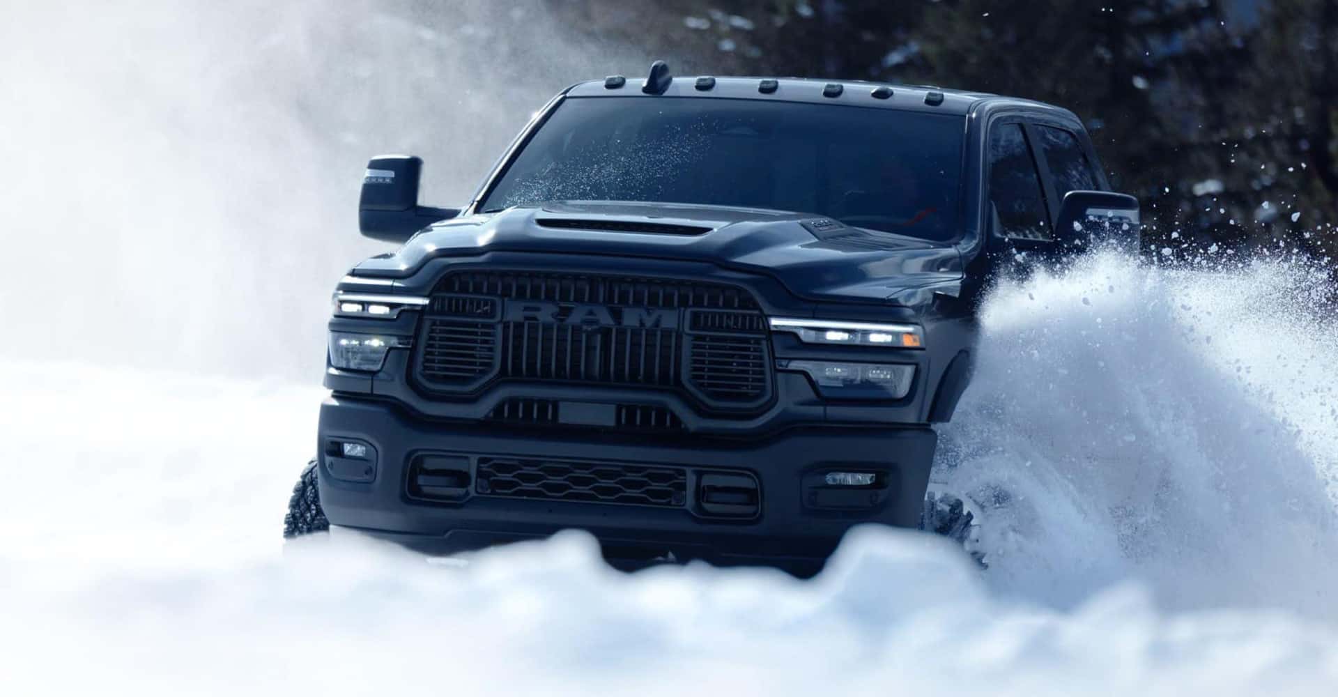 black-ram-truck-in-snow