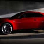 Red-Dodge-Charger-driving-through-tunnel
