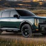 Green 2027 Kia Telluride on a dirt road