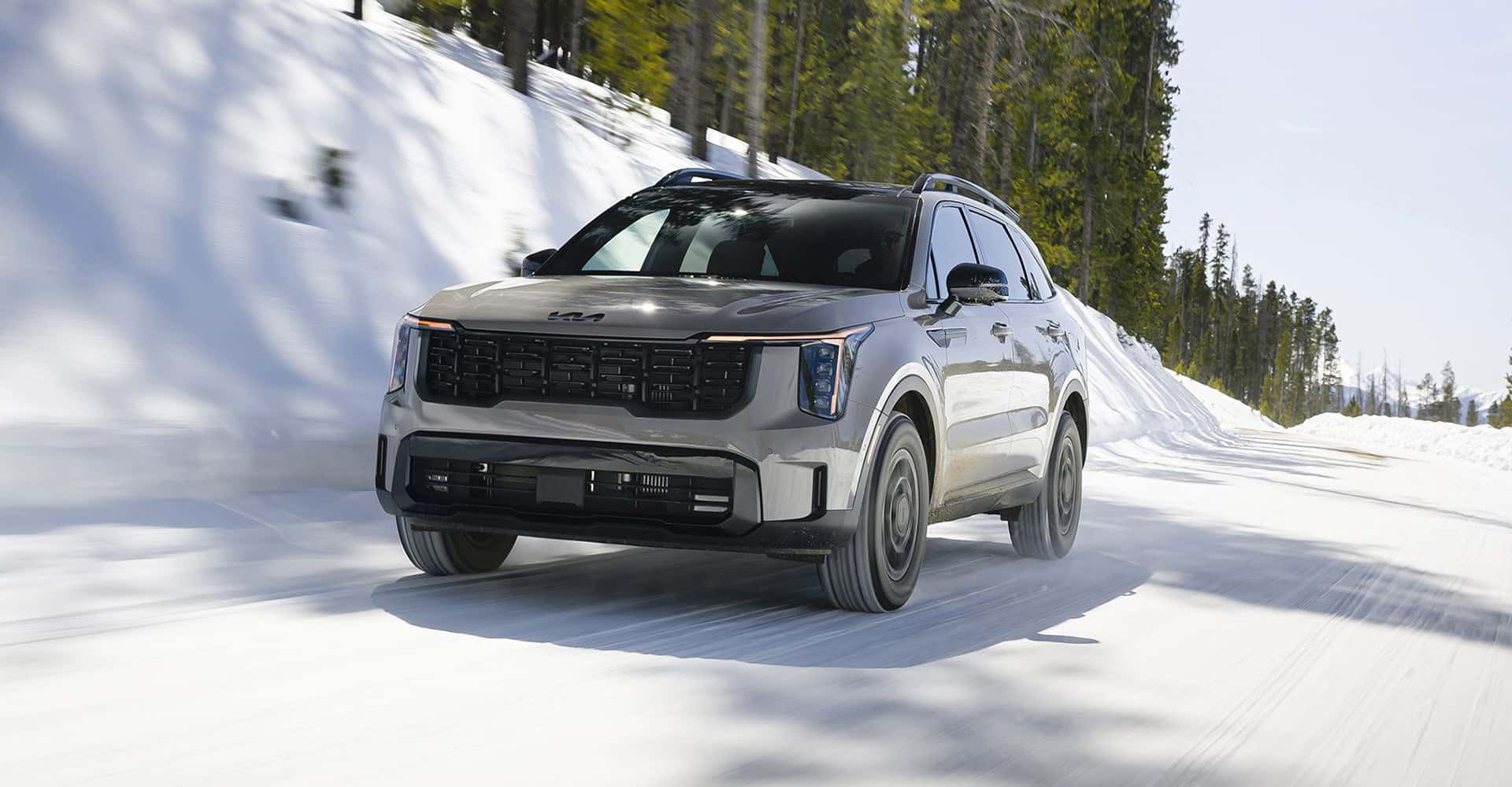 2026 Kia Sorento in grey driving in snow