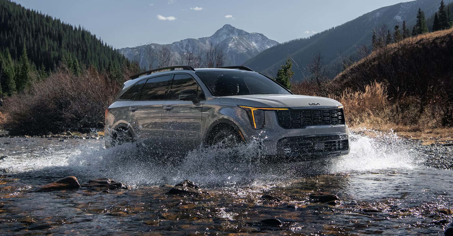 2026 Kia Sorento in grey driving in water