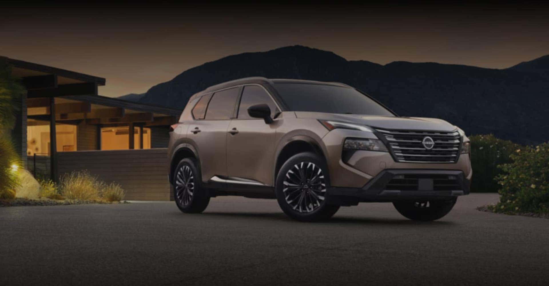 2025 Nissan Rogue parked outside house