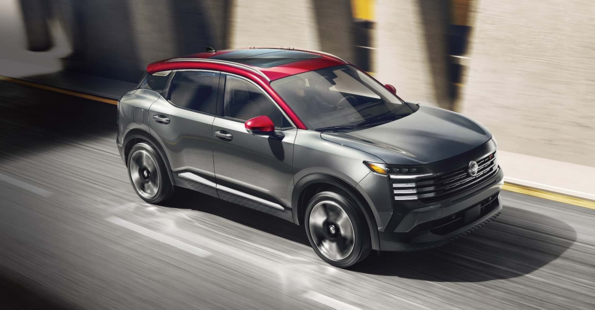 2026-Nissan-Kicks-Two-tone-colors-driving-down-highway