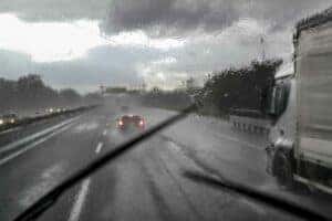 Ford F-150 windshield, driving in rainy conditions on road