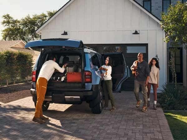 Friends going camping in a 2024 Toyota Land Cruiser