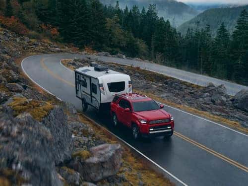 2025 Toyota 4Runner towing a small camper