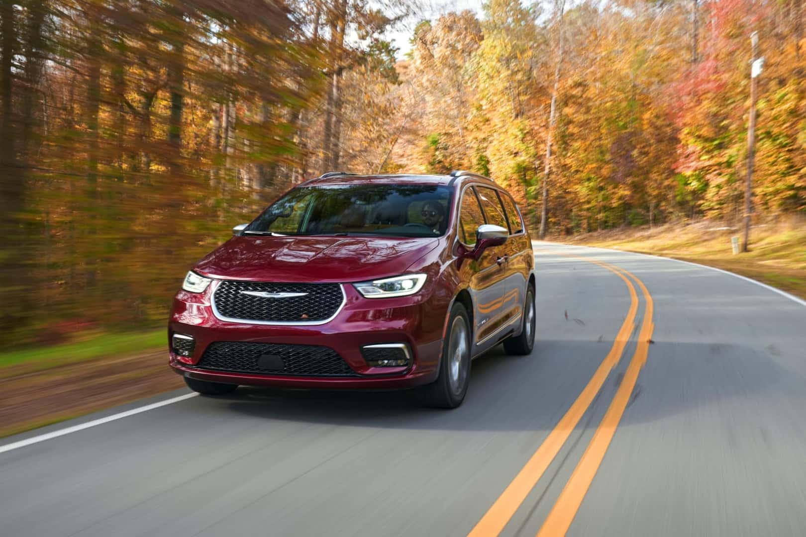 Chrysler Pacifica driving through Naperville, IL